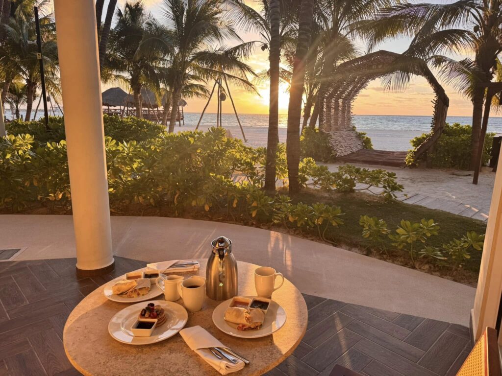 Beautiful sunset over pristine beach at El Dorado Maroma Beach Resort