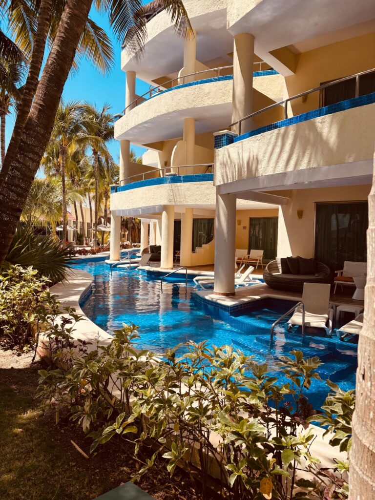 Private balconies overlooking wading pools at El Dorado Maroma adult-only resort