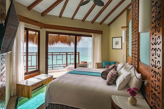 Palafitos overwater bungalow El Dorado Maroma luxury hotel upgrade