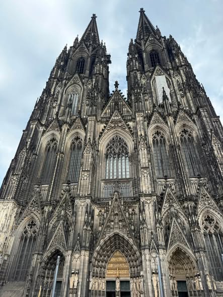 Cologne Cathedral's Gothic twin spires on a Rhine river cruise in Germany
