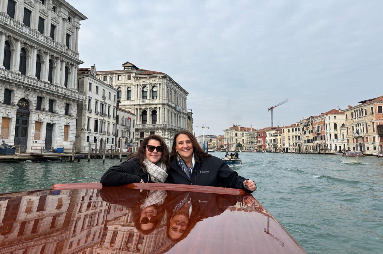 Sarah Bonsall and Heather on a water taxi on the Grand Canal in Venice