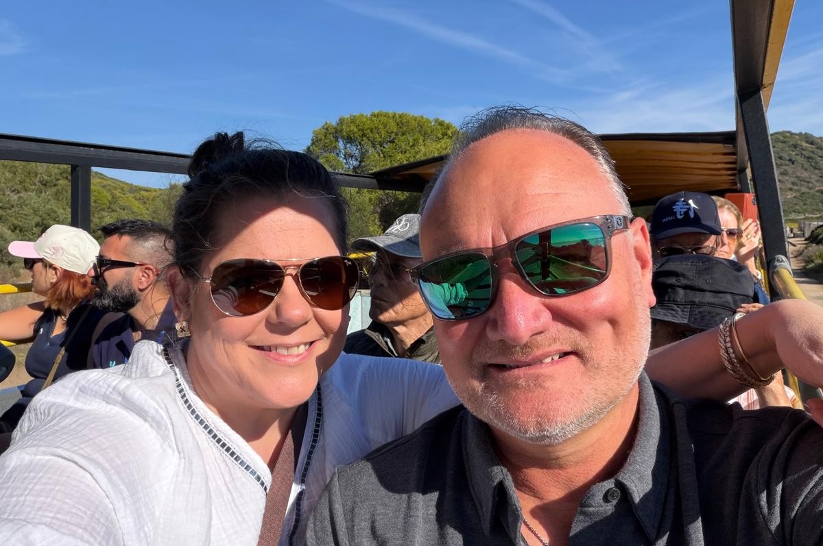 Sarah and John on the top deck of a double decker bus in Corsica on a Mediterranean cruise port day