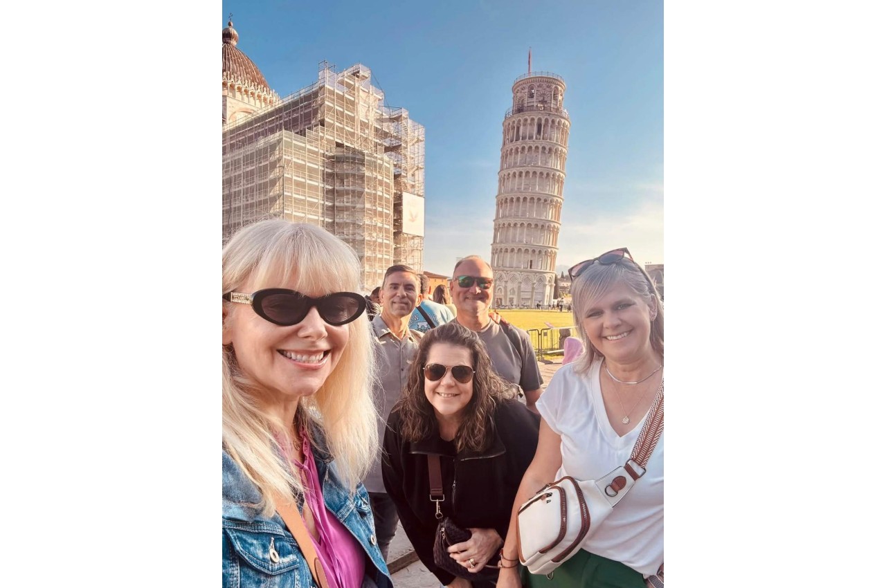 Travelers in front of the Leaning Tower of Pisa on a Mediterranean cruise shore day